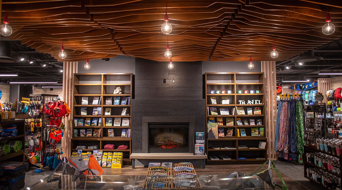 Clubhouse: Teak wood ceiling, fireplace surround, bookcases, divider walls