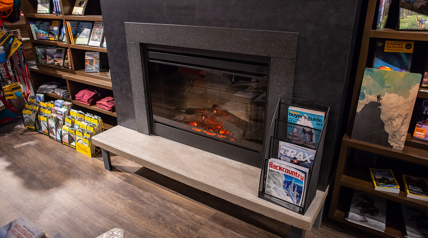 fireplace surround: quartz fireplace legs + header with metal buildout