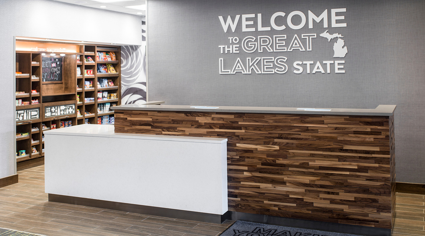 front reception desk with textured interwoven panels