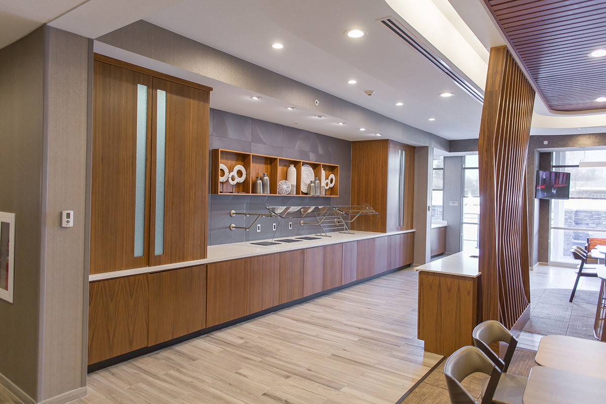 teak wood business center with custom cabinetry