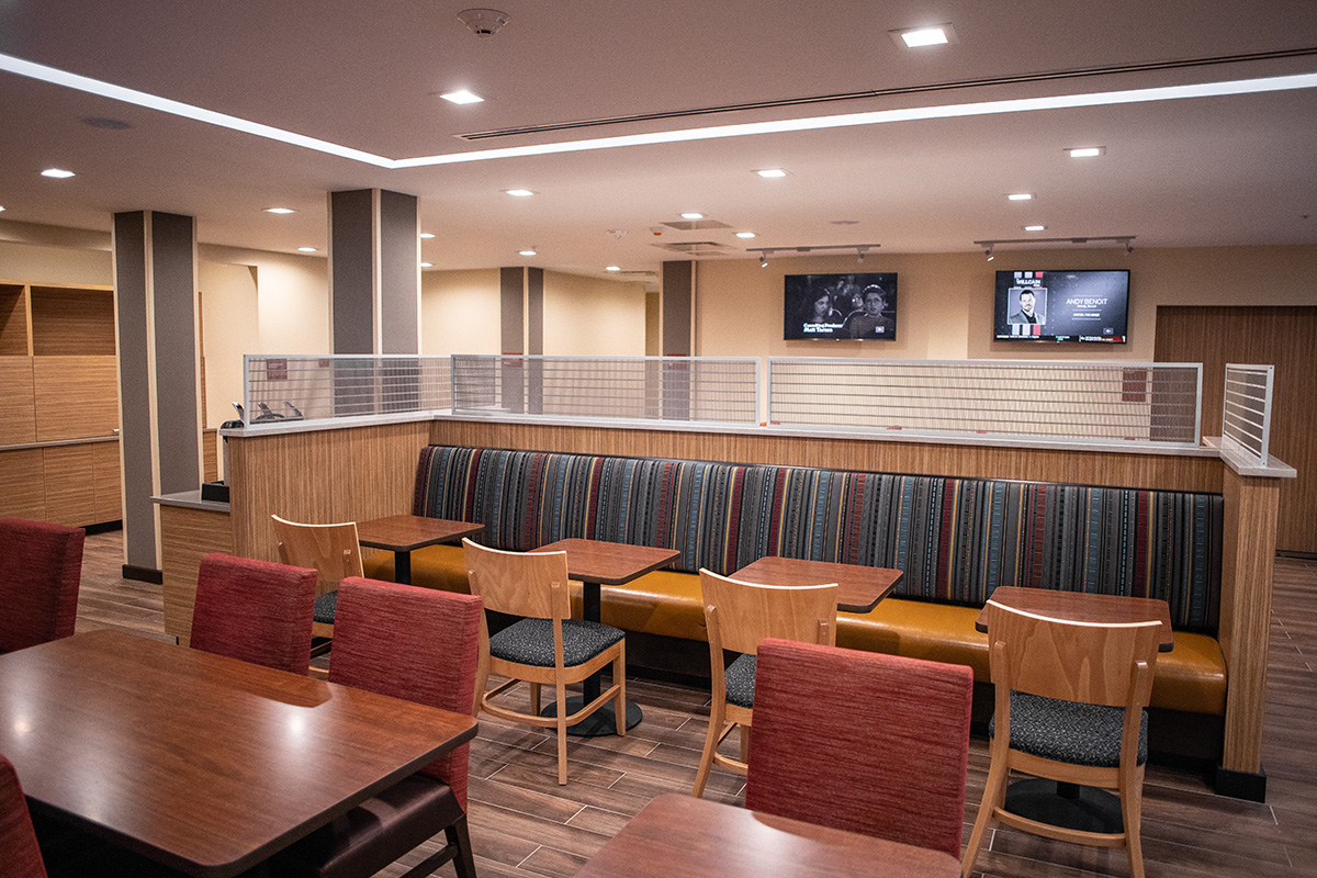 banquette fabricated bench seats, quartz countertops and metal mesh toppers