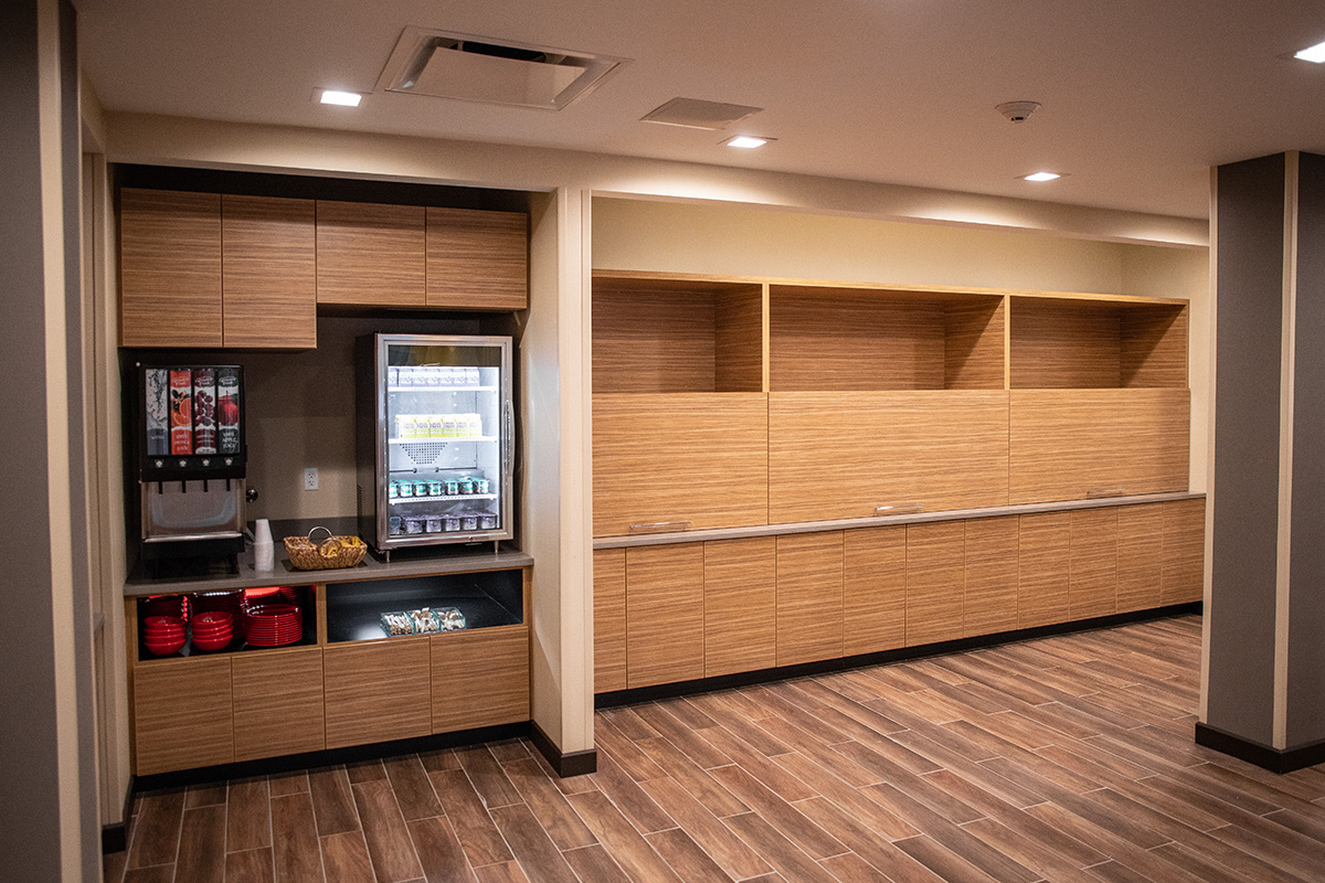 buffet cabinetry with vertical sliding doors