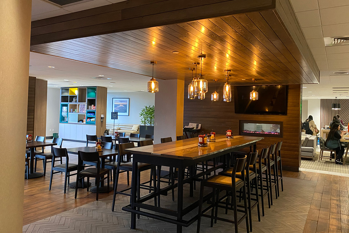 hickory table and ceiling in hotel lobby